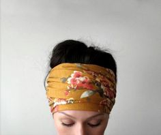 "This head scarf comes in a rich shade of ochre with a vintage floral print. The fabric is a medium weight jersey knit with a minimal amount of stretch to it. Incredibly easy to style, stays put all day long, and adjusts to any head size. Hand sewn with a double layer and perfectly finished with a clean blind stitch. The Details: - Length - approximately 65\" - Width - approximately 6\" - Color - ochre floral - Material - Jersey blend - Hand wash cold, hang dry If you're new to EcoShag head scar Scarf Head Wrap Tutorial, Dark Mustard Yellow, Extra Wide Headband, Dread Locks, Headwrap Tutorial, Jersey Scarf, Blind Stitch, Cotton Headband, Yoga Headband