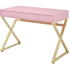 a pink desk with gold legs and drawers