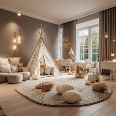 a living room with a teepee tent on the floor