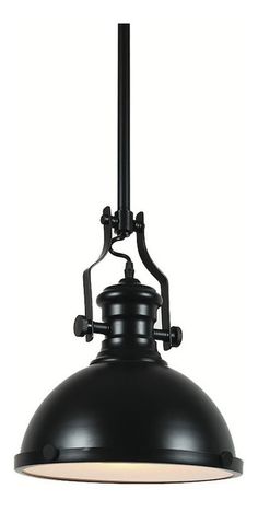 an industrial style black pendant light hanging from the ceiling