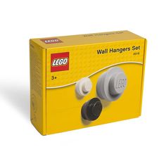 the lego wall hangers set is yellow with black knobs and white trimming