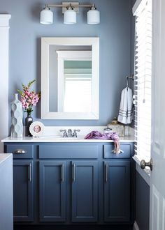 A blue bathroom can be bold or calmingdepending on the shadethe tilesthe lightingand the accessories These blue bathrooms all get it right. Dark Blue Bathrooms, Bathroom Wall Colors, Light Blue Bathroom, Small Bathroom Colors, Blue Bathroom Vanity, Blue Bathroom Decor