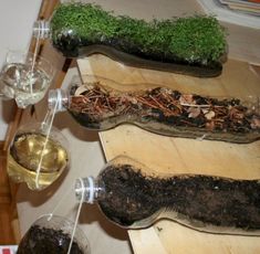 a table topped with wine glasses filled with different types of food and veggies