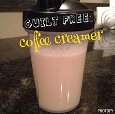 a coffee creamer sitting on top of a counter