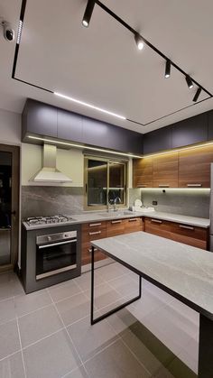 Modernize your kitchen with sleek magnetic track lighting. Stylish, functional, and perfect for any space. Setting Room Design Modern, Track Ceiling Lights, Ceiling With Track Lights, Profile Led Ceiling Design, Magnetic Lights Ceiling, Modern Lighting Design Ceilings, Magnetic Track Light Ceiling, False Ceiling For Kitchen, Track Light Ceiling Design