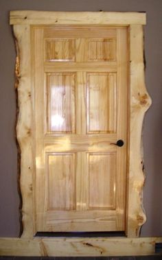 a wooden door sitting on top of a table