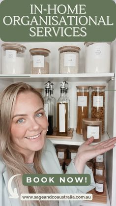 a woman is smiling and holding out her hand in front of an open refrigerator door