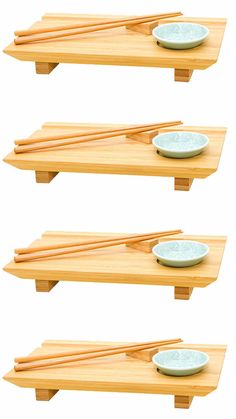 three wooden shelves with plates and chopsticks on them