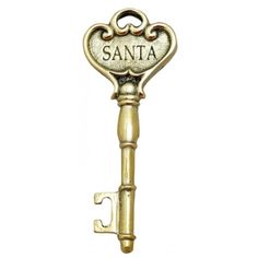 a golden key with the word santa on it's front and back ends are shown