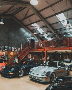 there are many cars parked in the garage