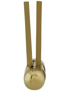 a gold colored metal object with two long straps on it's ends and a ball in the middle