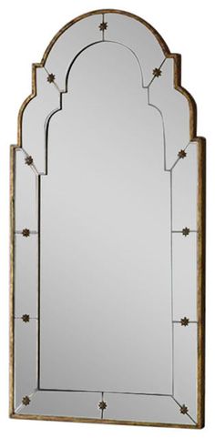 a mirror that is sitting on top of a wall with an arched frame and gold trimming