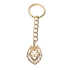 a gold keychain with a lion head on the front and bottom part of it