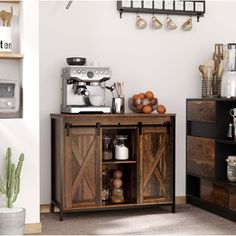 a coffee machine is sitting on top of a wooden cabinet