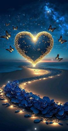 there is a heart made out of flowers and butterflies on the beach at night with stars in the sky