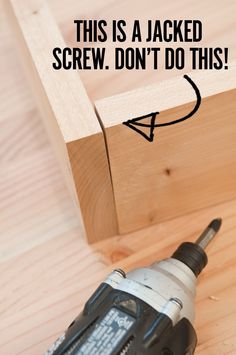 a drill is laying on top of a piece of wood with the words, this is a jacked screw don't do this