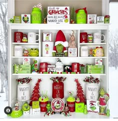 a shelf filled with lots of christmas items