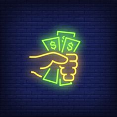 neon hand with five dollar bills against a dark brick wall, lit by neon lights