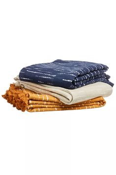 four pieces of cloth stacked on top of each other