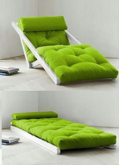 the futon bed is made out of wood and green fabric