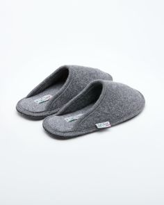 Description: The Le Clare women's Stella in grey is the classic "hotel slipper" reimagined in luxurious boiled wool. This quintessential slipper provides delicate comfort and has been handcrafted, only for the most discerning, the Stella will not disappoint. Featuring our premium Italian boiled wool fiber, the slipper gently conforms to your foot for cozy comfort. The natural elasticity of our wool bounces back to its original shape, giving the slipper lasting appeal with a customized fit. This Classic Hotel, Natural Contour, Wool Slippers, Boiled Wool, House Slippers, Comforters Cozy, Slide Slipper, Ballet Flats, Men's Shoes