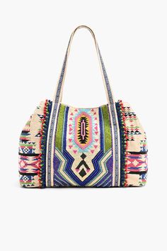 The Tribal Hand-beaded Tote Bag comes with a comfortable shoulder strap, a magnetic snap closure as well as an expanding center clasp. It also has a zip pocket inside. This bag is perfect for an overnight trip or just a day out. Embellished Embroidery, Embroidered Shoulder Bag, Boho Bags, Patchwork Bags, Boho Bag, Gorgeous Bags, Jacquard Fabric, Beautiful Bags, Hand Beading