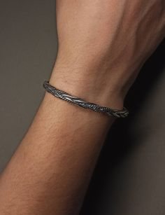 Oxidized 925 k solid sterling silver twisted knot cuff bracelet for men and women.  Viking style medium heavy silver bangle for men. Men's solid silver jewelry gift. SIZING  This bracelet is adjustable and suitable for men's and women's use . PACKAGING  Comes with jewelry gift box , ready to gift. Custom gift message is available.  PRODUCTION  All our jewelry is handmade in our own workshop with high quality materials.  Visit my shop for all my designs  !  Thank you.  https://bhclco.etsy.com Men Cuff Bracelet, Women Viking, Bracelet Viking, Viking Style, Twist Knot, Bracelet For Men, Oxidized Silver, Silver Bangles, Silver Cuff