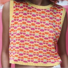 Retro Sleeveless Floral Jacquard Knit Sweater Vest Top - Yellow, Orange & Pink No Size: Fits Like S/M No Brand, Looks Just Like The Sweater Vest From Zara! Vibrant Retro Yellow, Orange, Pink, And Blue Retro Floral Print, 60s Or 70s Vibe. Sleeveless W/ Round Neck. Cropped Relaxed Fit Style. Soft Knit, 25% Nylon, 40% Acrylic & 35% Polyester Good Condition, New, Never Worn. No Flaws, Holes Or Stains. First Picture Is A Stock Photos, Photos Of The Actual Item After. Jacquard Knit Sleeveless Vest, Casual Jacquard Knit Sleeveless Sweater Vest, Spring Jacquard Knit Sweater Vest, Casual Jacquard Knit Sleeveless Top, Retro Jacquard Knit Tops For Spring, Casual Jacquard Knit Vest, Yellow Sleeveless Top For Fall, Multicolor Sleeveless Knit Sweater, Winter Jacquard Knit Sleeveless Sweater Vest