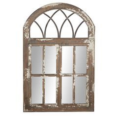 an old window with arched glass and mirror reflection on the wall, isolated against a white background