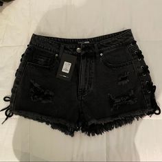 Super Cute Moto Shorts With Lace Up The Side. Never Worn, Run A Bit Small. High Waisted. New With Tags Cheap Mini Denim Bottoms, Black Nice Shorts, Everyone Sucks But Me Lace Shorts, Cheap Cutoff Bottoms For Night Out, Edgy Denim Shorts, Cheap Y2k Party Bottoms, Black Wavy Shorts, Femboy Short Shorts, Cheap Black Low-rise Bottoms