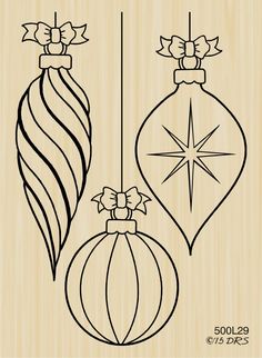 an ornament with two ornaments hanging from it's side on a wooden background