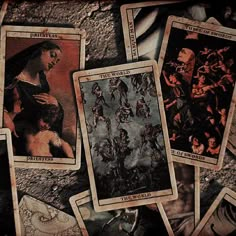 several tarot cards with pictures of women and men on them, all in different colors