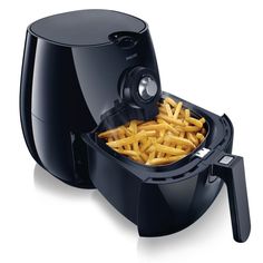 an air fryer with french fries in it