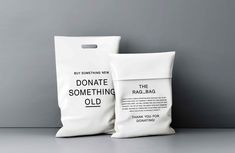 two bags sitting next to each other on top of a white table with the words, the rag - bag