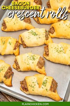 cheeseburger crescent rolls on a baking sheet with text overlay that reads, cheesy crescent rolls