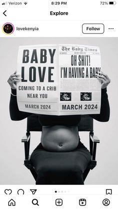 a person sitting in a chair with a newspaper over their head and the words baby love on it