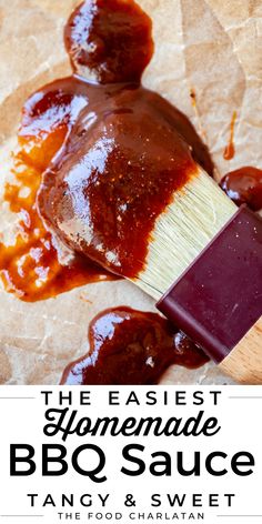 the easy homemade bbq sauce is on top of a piece of wax paper with a brush