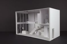 a cut out model of a house with stairs