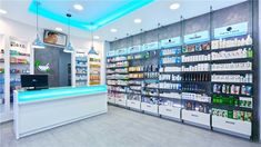 a pharmacy store with shelves full of medicine and medical supplies on the wall behind the counter