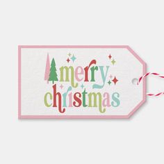 a merry christmas gift tag on a white background