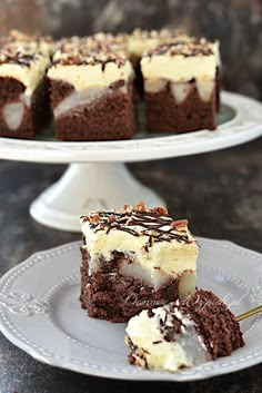 there is a piece of cake on the plate and one slice has been cut out