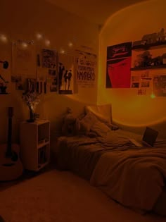 a bed room with a guitar on the wall