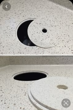 there is a hole in the counter that looks like it has a crescent on it