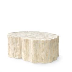 a table made out of wood with white paint on the top and bottom, it is round