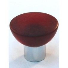 a red bowl sitting on top of a metal base