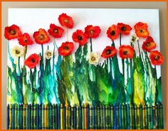 an art project with red and white flowers