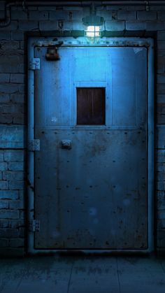 an open door in a brick wall with a light shining on the top and bottom