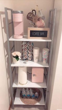 a shelf filled with coffee cups and other items