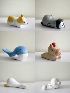 six small ceramic figurines of different colors and sizes, each with an animal's head