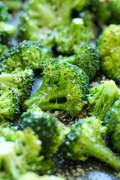 broccoli florets on a baking sheet ready to be cooked